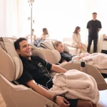 Guests receiving IV drips at Dripology event