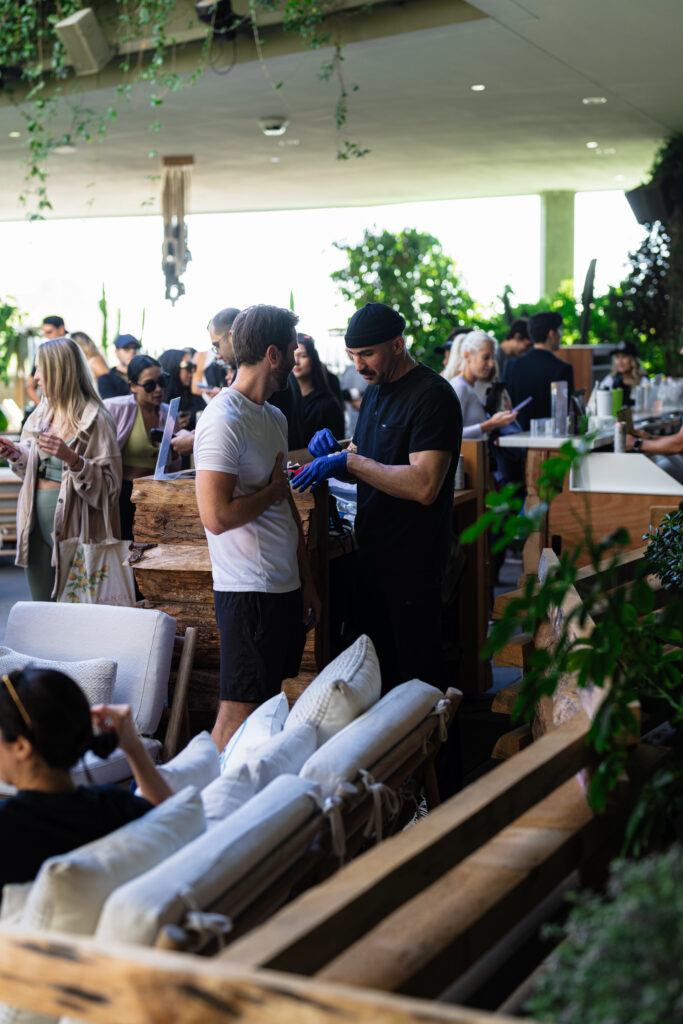 Dripology team providing workplace wellness services